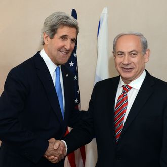 JERUSALEM, ISRAEL - APRIL 09: In this handout image provided by U.S. Embassy Tel Aviv, Israel's Prime minister Benjamin Netanyahu shakes hands with U.S. Secretary of State John Kerry on April 09, 2013 in Jerusalem, Israel. Secretary Kerry is in the region to meet with Israeli and Palestinian officials in an attempt to help restart the peace process.(Photo by Matty Ster/U.S. Embassy Tel Aviv via Getty Images)