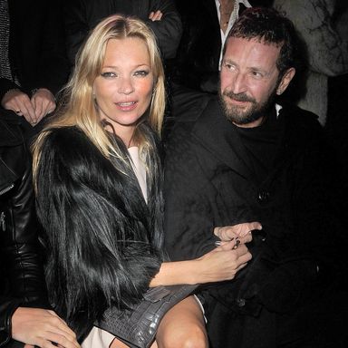 PARIS, FRANCE - JANUARY 24:  Kate Moss and Stefano Pilati attend the Etam Fashion Show Spring/Summer 2011 Collection Launch at Grand Palais on January 24, 2011 in Paris, France.  (Photo by Pascal Le Segretain/Getty Images For Etam)