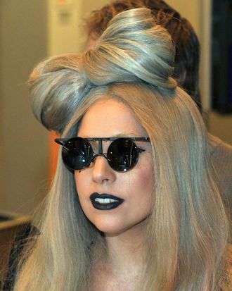 US pop singer Lady Gaga arrives at Narita International Airport, suburdan Tokyo on December 20, 2011. The pop star will attend a Japanese television's music program. AFP PHOTO / KAZUHIRO NOGI (Photo credit should read KAZUHIRO NOGI/AFP/Getty Images)