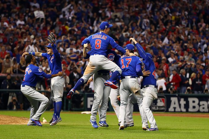 Photos of the Chicago Cubs Hugging After World Series Win