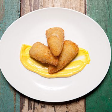 Stuffed calamari, shellfish risotto, saffron aioli ($13)