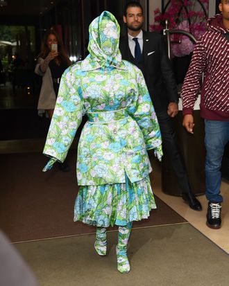 Cardi B Wears Floral Face Mask at Paris Fashion Week