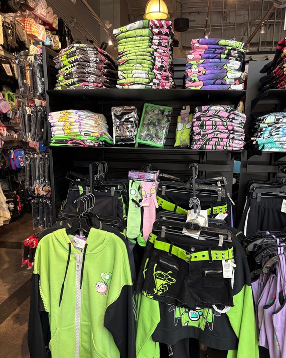 A GIR-related display with hoodies, T-shirts, and shorts. 