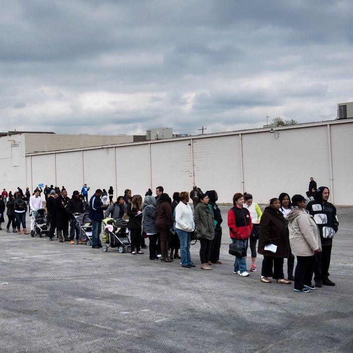 People wait in line for early voting in the parking lot of the Northland Park Center on November 4, 2012 in Columbus, Ohio. Ohio, a battleground state, is closely contested between US President Barack Obama and Mitt Romney. No Republican has won the US presidency without winning Ohio's electoral votes. 