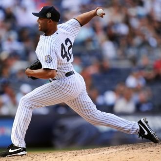 Mariano Rivera #42 of the New York Yankees throws a pitch during the ninth inning against the San Francisco Giants during interleague play on September 22, 2013 at Yankee Stadium in the Bronx borough of New York City. The Giants defeat the Mets 2-1.