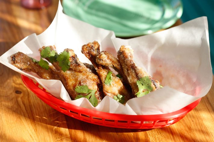 Twice-cooked duck wings with smoked-habanero honey.