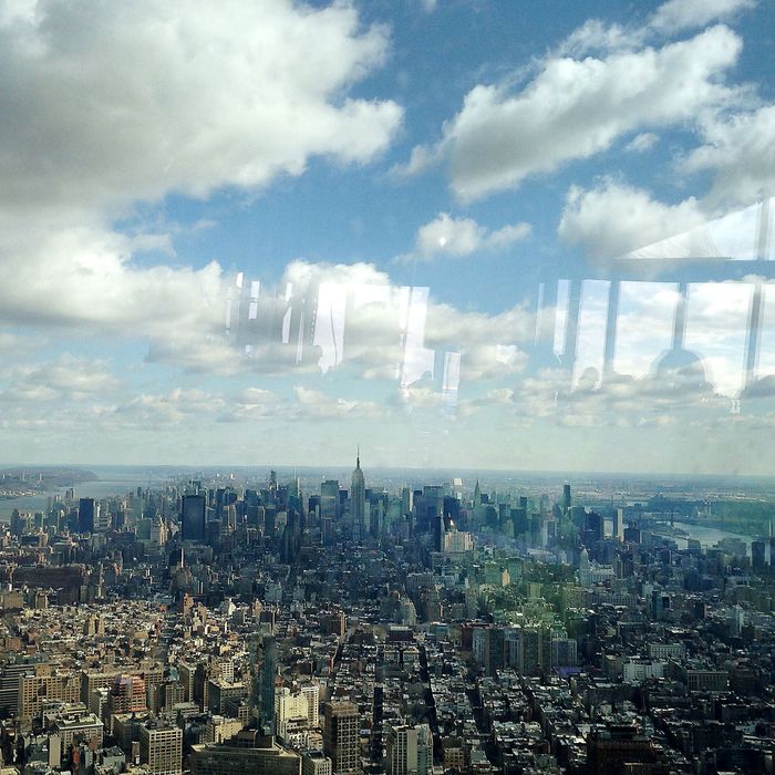 The Manhattan skyline is seen from the One World Trade Center observation deck in New York, U.S., on Tuesday, April 2, 2013. The observation deck at One World Trade Center, expected to open in 2015, will occupy the tower's 100th through 102nd floors. Guests visiting the observation deck will see a 
