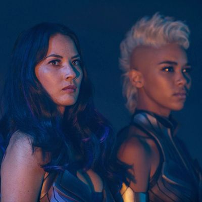 DF-13452 – Psylocke (Olivia Munn, left) and Storm (Alexandra Shipp) are two of Apocalypse’s Four Horsemen. Photo Credit: Alan Markfield.