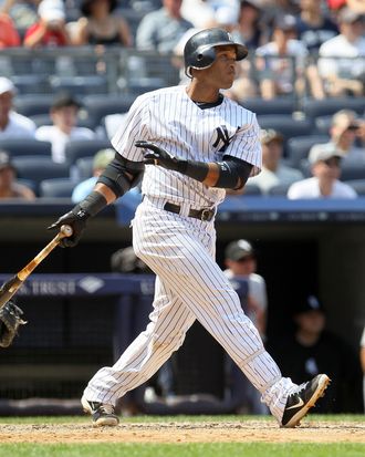 NEW YORK, NY - JULY 01: Robinson Cano #24 of the New York Yankees follows through on his third inning two-run home run against the Chicago White Sox at Yankee Stadium on July 1, 2012 in the Bronx borough of New York City. (Photo by Jim McIsaac/Getty Images)