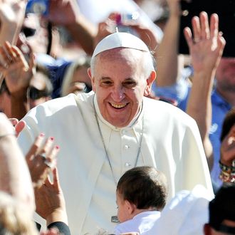 Pope Francis arrives for his general audience in St Peter's square at the Vatican on September 18, 2013 . 