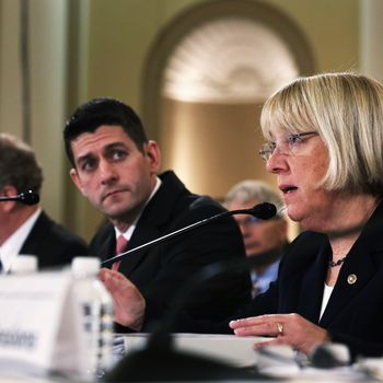 U.S. Sen. Patty Murray (D-WA) (R) speaks as Rep. Paul Ryan (R-WI) (L) listens during a Conference on the FY2014 Budget Resolution meeting November 13, 2013 on Capitol Hill in Washington, DC. Congressional Budget Office Director Doug Elmendorf briefed the conferees on CBO's budget and economic outlook.