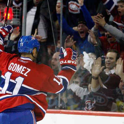 Scott Gomez #11 of the Montreal Canadiens celebrates his second period goal during the NHL game against the New York Rangers