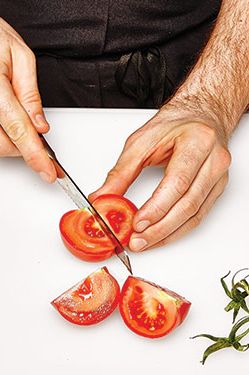 1. Remove stem. With a serrated knife, halve twice.