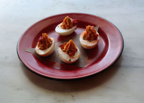 Huevo al Diablo: deviled egg, smoked bacalao, and roasted pepper.