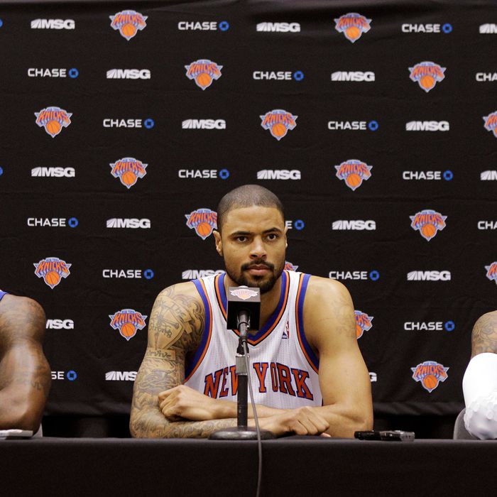 From left, New York Knicks forward Amare Stoudemire, center Tyson Chandler, and forward Carmelo Anthony address members of the media during a press conference debuting the NBA basketball team's new front court at the team's training facility in Greenburgh, N.Y., Monday, Dec. 12, 2011. (AP Photo/Kathy Willens)