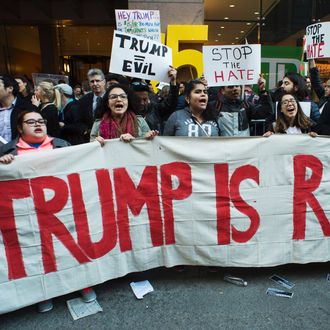 Protesters gather near Grand Central Station to protest against US Republican presidential candidate Donald Trump who was attending a New York GOP Gala April 14, 2016 in New York.