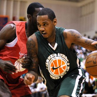 Carmelo Anthony drives to the hoop during the Goodman League All-Stars taking on The Melo League.