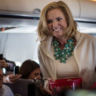 Relaxed and chatty, Ann Romney passes out homemade Welsh Cakes, her grandmother's recipe, and tells the press about how her GOP Convention speech is going and what she'll be wearing, aboard the campaign plane bound for Tampa, in Boston, Massachusetts on Tuesday morning, August 28, 2012.