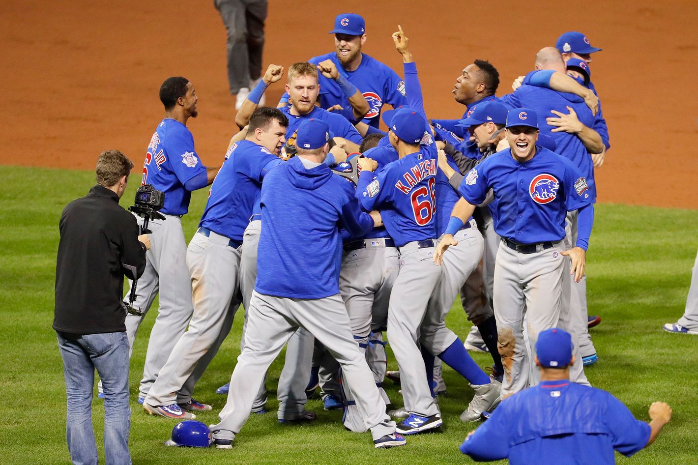 Photos of the Chicago Cubs Hugging After World Series Win