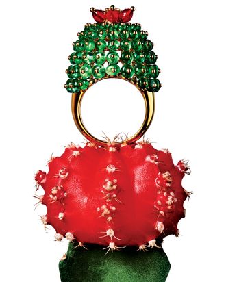 This ring has more than 100 emeralds and five carnelians.