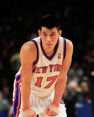 NEW YORK, NY - FEBRUARY 15: Jeremy Lin #17 of the New York Knicks looks on against the Sacramento Kings at Madison Square Garden on February 15, 2012 in New York City. NOTE TO USER: User expressly acknowledges and agrees that, by downloading and/or using this Photograph, user is consenting to the terms and conditions of the Getty Images License Agreement. (Photo by Chris Trotman/Getty Images)