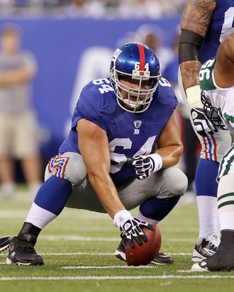 EAST RUTHERFORD, NJ - AUGUST 29: David Baas #64 of the New York Giants in action against the New York Jets during their pre season game on August 29, 2011 at MetLife Stadium in East Rutherford, New Jersey. (Photo by Jim McIsaac/Getty Images)