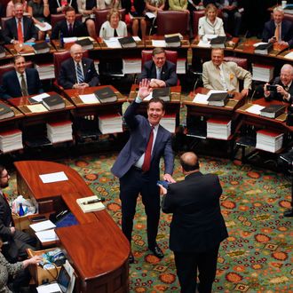 New Senate Majority Leader John Flanagan, R-Smithtown, waves to the gallery before being sworn-in in the Senate Chamber at the Capitol on Monday, May 11, 2015, in Albany, N.Y. Flanagan succeeds Republican Dean Skelos who resigned his position as leader following his arrest on federal corruption charges. (AP Photo/Mike Groll)