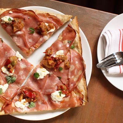 Mortadella pizza with ricotta, marjoram, and Bomba.