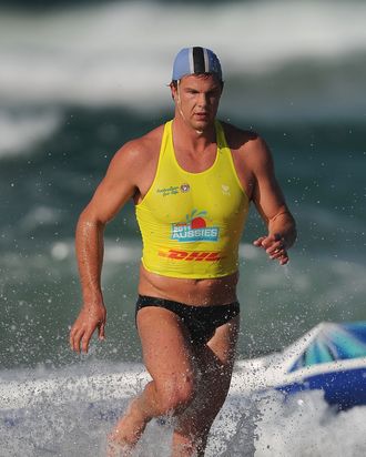 GOLD COAST, AUSTRALIA - APRIL 07: Competitor runs exits the water in the Open Men's Ironman during the 2011 Australian Surf Lifesaving Championships at Kurrawa Beach on April 7, 2011 in Gold Coast, Australia. (Photo by Matt Roberts/Getty Images)