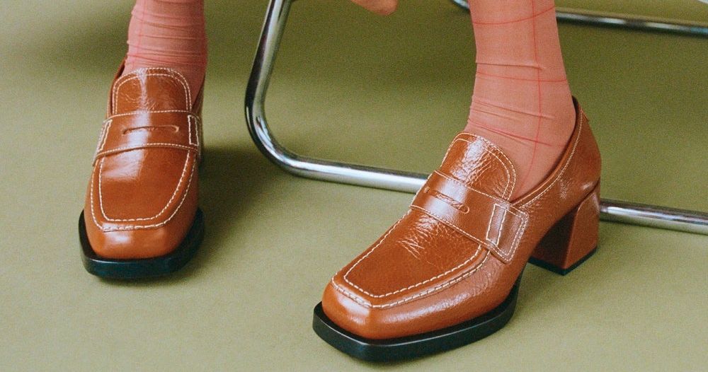 office all rise black chunky heeled two buckle boots