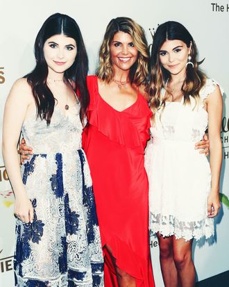 Lori Loughlin (center) with her daughters Bella (left) and Olivia Jade.