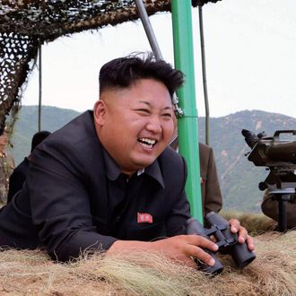 epa04316269 A picture released by the North Korean Central News Agency (KCNA) on 15 July 2014 shows North Korean leader Kim Jong-un (C) attending a live-fire drill by a North Korean artillery unit near the eastern border with South Korea. KCNA reported it on 15 July 2014, without elaborating on the timing of the visit. EPA/KCNA SOUTH KOREA OUT