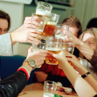 College Students Toasting --- Image by ? Image Source/Corbis