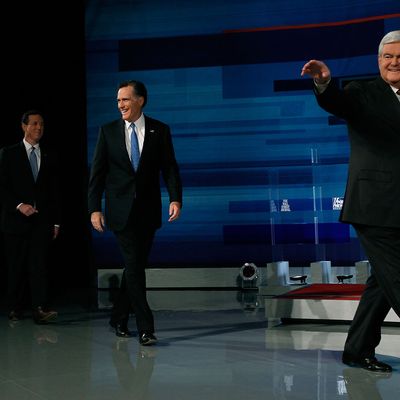 MYRTLE BEACH, SC - JANUARY 16: Republican presidential candidates (L-R) Texas Gov. Rick Perry, former U.S. Sen. Rick Santorum of Pennsylvania, former Massachusetts Gov. Mitt Romney and former U.S. House Speaker Newt Gingrich walk onstage before participating in a Fox News, Wall Street Journal sponsored debate at the Myrtle Beach Convention Center on January 16, 2012 in Myrtle Beach, South Carolina. Voters in South Carolina will head to the polls on January 21 to vote in the Republican primary election to pick their choice for U.S. presidential candidate. (Photo by Joe Raedle/Getty Images)