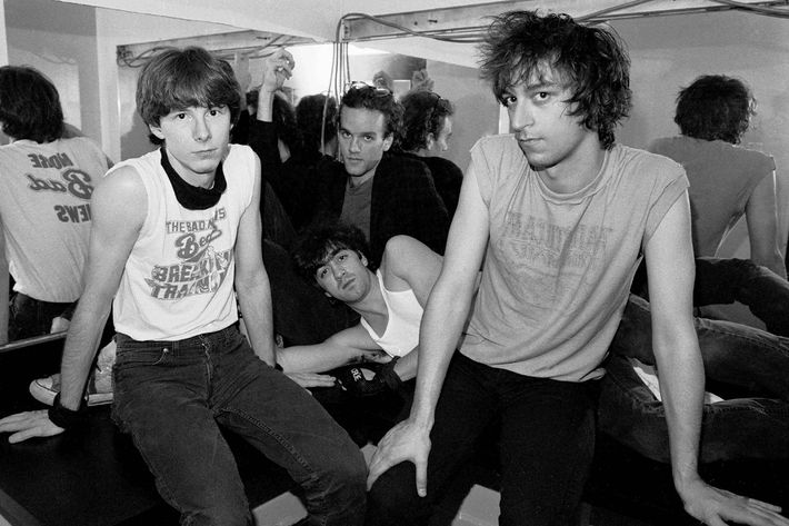 UNITED STATES - JUNE 22:  PALLADIUM  Photo of Michael STIPE and Mike MILLS and REM and Peter BUCK and Bill BERRY, L-R: Mike Mills, Michael Stipe (back), Bill Berry (lying in front), Peter Buck - posed, group shot, backstage in dressing room  (Photo by Richard E. Aaron/Redferns)