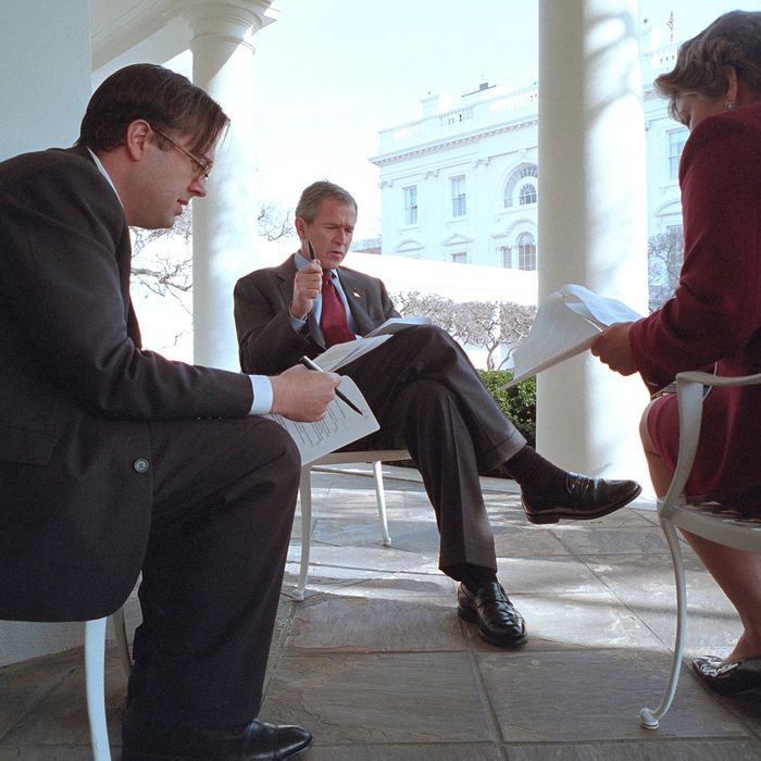 President George W. Bush prepares for his State of the Union Speech with Karen Hughes, Counselor to the President, and Michael Gerson, Director of Presidential Speech Writing, outside the Oval Office January 29, 2002 in Washington DC. 