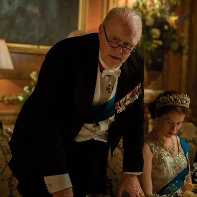 John Lithgow as Winston Churchill, Claire Foy as Elizabeth.