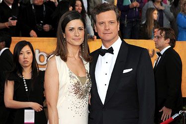 Feb. 27, 2011 - Hollywood, California, U.S. - Actor COLIN FIRTH wearing a Tom  Ford tuxedo and wife LIVIA GIUGGIOLI wearing a panelled gown recycled from  old dresses for the red carpet