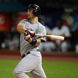 David Wright #4 of the United States drives in a run with a ground out in the sixth inning against Venezuela during day 5 of round 2 of the World Baseball Classic at Dolphin Stadium on March 18, 2009 in Miami, Florida. Venezuela defeated the United States 10-6. 
