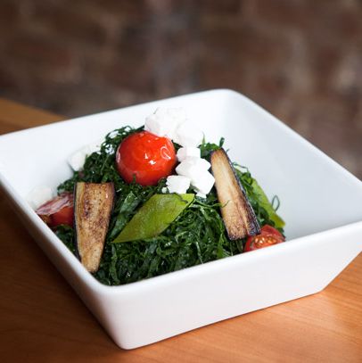 Kale salad with eggplant, tomato, green pepper, and Feta.