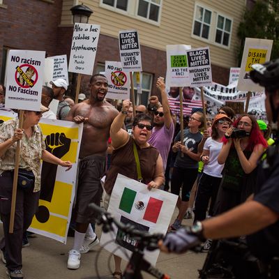 Demonstrators march during the Shut Down Trump & the RNC protest.