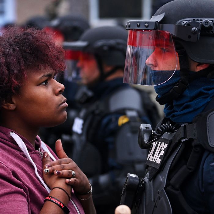 Protesters face police in Brooklyn Center, Minnesota.