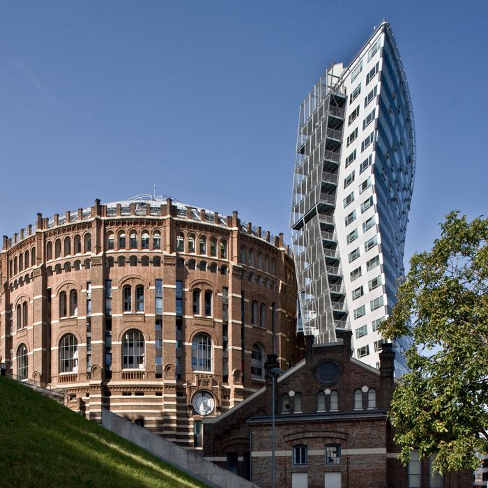 Converted Gasometer B, residential conversion of Deconstructivism architecture rebuilt (1999-2001) by Coop Himmelb, Gasometers from 1896 to 1899 in the Simmering district of Vienna, Austria