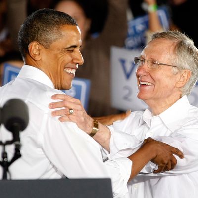 LAS VEGAS - OCTOBER 22: U.S. President Barack Obama (L) and U.S. Senate Majority Leader Harry Reid (D-NV) appear at a campaign rally at Orr Middle School Park October 22, 2010 in Las Vegas, Nevada. Reid, who is seeking his fifth term, is in a tight race with Republican challenger Sharron Angle. (Photo by Ethan Miller/Getty Images) *** Local Caption *** Barack Obama;Harry Reid