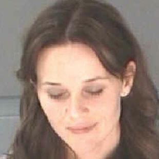  In this booking photo provided by the City of Atlanta Department of Corrections, actress Reese Witherspoon, real name Laura Jeanne Witherspoon, poses in a booking photo on April 19, 2013 in Atlanta, Georgia. Witherspoon was charged with disorderly conduct after her husband, Jim Toth, was arrested for driving while intoxicated.