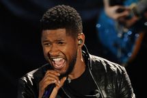 Usher performs at the Clinton Foundation's Decade of Difference concert on October 15, 2011 at the Hollywood Bowl in Hollywood, California. The concert celebrates 10 years of the former US president's Clinton Foundation.   RESTRICTED TO EDITORIAL USE    AFP PHOTO / ROBYN BECK (Photo credit should read ROBYN BECK/AFP/Getty Images)