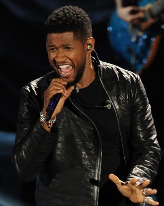 Usher performs at the Clinton Foundation's Decade of Difference concert on October 15, 2011 at the Hollywood Bowl in Hollywood, California. The concert celebrates 10 years of the former US president's Clinton Foundation. RESTRICTED TO EDITORIAL USE AFP PHOTO / ROBYN BECK (Photo credit should read ROBYN BECK/AFP/Getty Images)