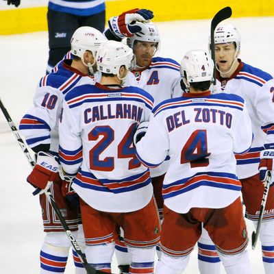 Marian Gaborik #10, Ryan Callahan #24, Brad Richards #19, Michael Del Zotto #4 and Derek Stepan #21 of the New York Rangers celebrate a second period goal against the Winnipeg Jets