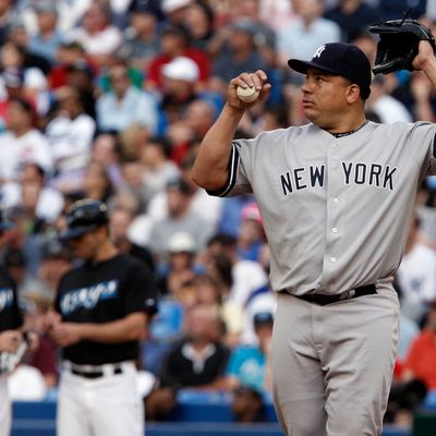 TORONTO, CANADA - JULY 14: Bartolo Colon #40 of the New York Yankees reacts to a 8 run first inning against the Toronto Blue Jays during MLB action at The Rogers Centre July 14, 2011 in Toronto, Ontario, Canada. (Photo by Abelimages/Getty Images)