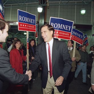 Massachusetts Republican candidate for the U.S. Senate Mitt Romney shakes the hand of a commuter while campaigning at North Station in Boston, Nov. 7, 1994. 